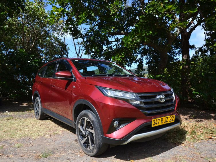 A red color Toyota Rush