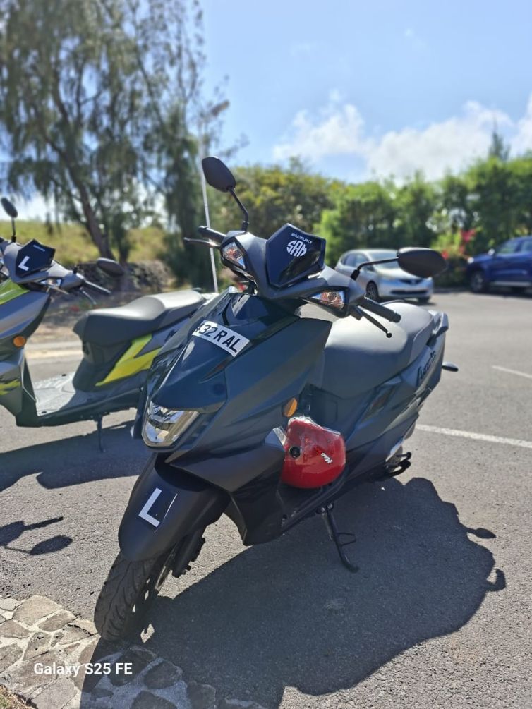 Sam Scooter Rodrigues Island with helmet