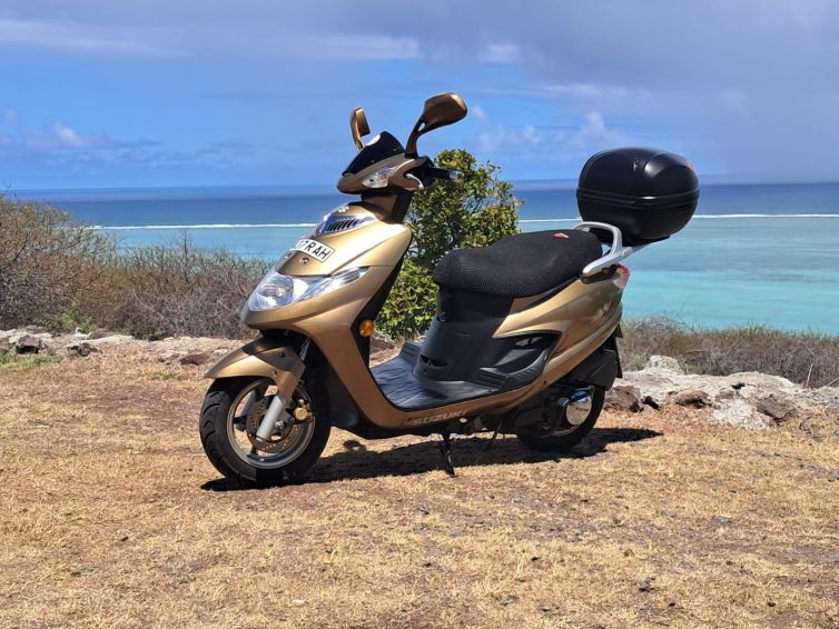 Scooter in Rodrigues Island with sea view