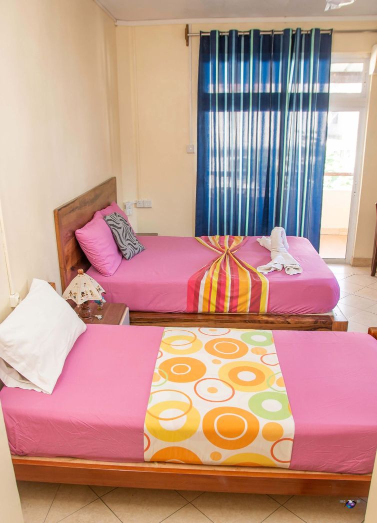 Two single bed in a room