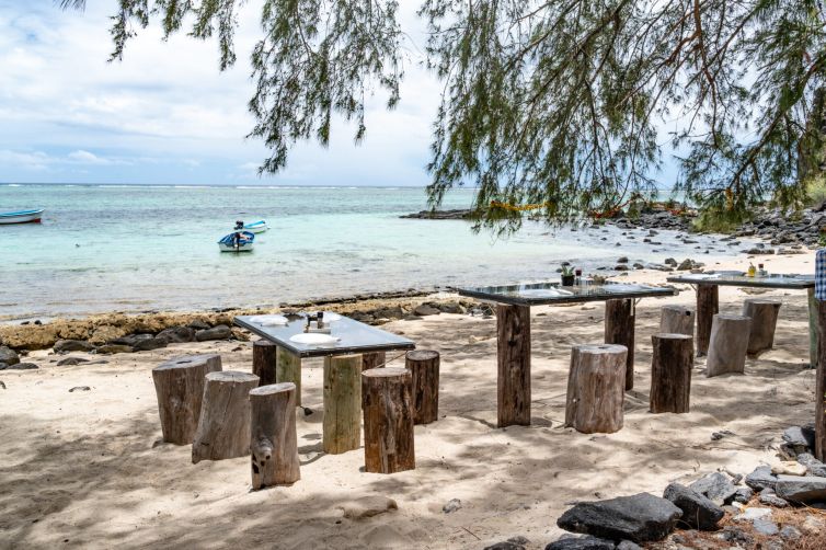 Resto beach under the filaos on a sunny day
